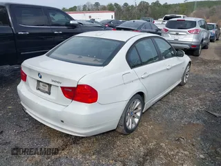 2011 BMW 3 Series 328i with VIN WBAPH7G50BNM55631, listed as a IAAI auction lot 41708771 with 196,086 mi miles. Bid and sale history available at carsss.com. Image 4.