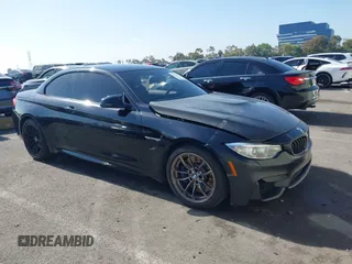 2015 BMW M4 z VIN WBS3U9C51FJ968052, wystawiony jako IAAI lot #42301612 z przebiegiem 80 556 mil mil oraz . Historia ofert i sprzedaży dostępna na DreamBid. Obrazek 1.