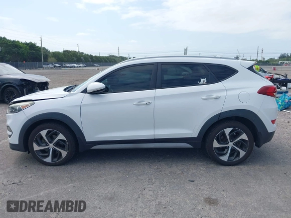 2018 Hyundai Tucson Sport with VIN KM8J33AL5JU691991, listed as a IAAI auction lot 41817480 with 89,129 mi miles. Bid and sale history available at carsss.com. Image 14.