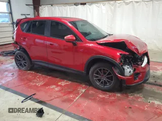 2016 Mazda CX-5 Touring with VIN JM3KE4CY0G0803265, listed as a Copart auction lot 51362065 with 84,955 mi miles and Salvage Title. Bid and sale history available at carsss.com. Image 4.