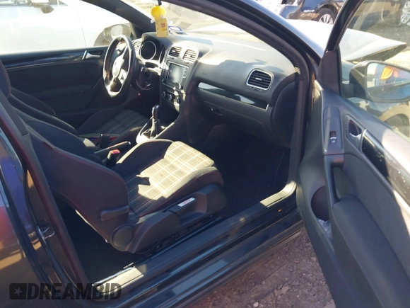 2012 Volkswagen GTI w/Conv & Sunroof with VIN WVWEV7AJ6CW161963, listed as a IAAI auction lot 41398810 with 172,582 mi miles and . Bid and sale history available at DreamBid. Image 5.