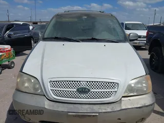 2004 Kia Sedona LX with VIN KNDUP131546549302, listed as a IAAI auction lot 41819215 with 125,881 mi miles. Bid and sale history available at carsss.com. Image 6.