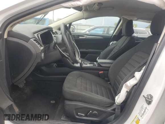 2020 Ford Fusion SE z VIN 3FA6P0T9XLR138977, wystawiony jako Copart lot #55260085 z przebiegiem 92 470 mil mil oraz Szkoda całkowita • Salvage title. Historia ofert i sprzedaży dostępna na DreamBid. Obrazek 7.