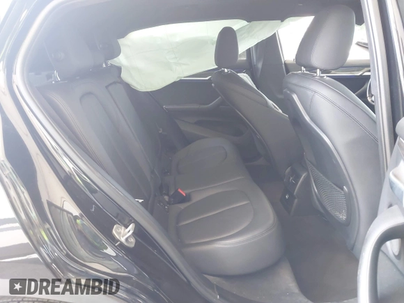 2018 BMW X2 sDrive28i with VIN WBXYJ3C32JEJ84291, listed as a IAAI auction lot 42575234 with 65,081 mi miles and . Bid and sale history available at DreamBid. Image 8.