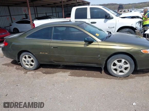 1999 Toyota Solara SE with VIN 2T1CF22PXXC247611, listed as a IAAI auction lot 41863240 with 153,823 mi miles. Bid and sale history available at carsss.com. Image 14.