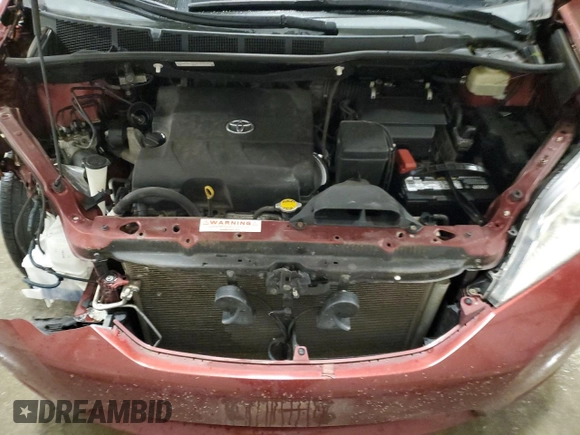2015 Toyota Sienna LE AAS с VIN 5TDKK3DC2FS677288, выставлен на аукционе Copart как лот 57882845 с пробегом 162 458 миль миль и Списание • Salvage title. История ставок и продаж доступна на DreamBid. Изображение 12.