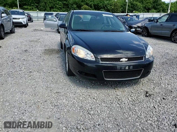 2014 Chevrolet Impala LTZ with VIN 2G1WC5E33E1164638, listed as a Copart auction lot 58699635 with 189,636 mi miles and Salvage title. Bid and sale history available at DreamBid. Image 13.