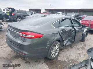 2017 Ford Fusion Energi SE with VIN 3FA6P0PU4HR306053, listed as a IAAI auction lot 41294944 with 88,603 mi miles. Bid and sale history available at carsss.com. Image 4.