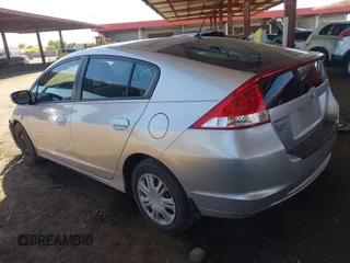2010 Honda Insight LX z VIN JHMZE2H53AS007016, wystawiony jako IAAI lot #42096274 z przebiegiem 173 519 mil mil oraz . Historia ofert i sprzedaży dostępna na DreamBid. Obrazek 3.