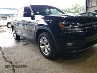 2018 Volkswagen Atlas SE z VIN 1V2DR2CA6JC544525, wystawiony jako Copart lot #55482545 z przebiegiem 131 950 mil mil oraz Szkoda całkowita • Salvage title. Historia ofert i sprzedaży dostępna na DreamBid. Obrazek 13.