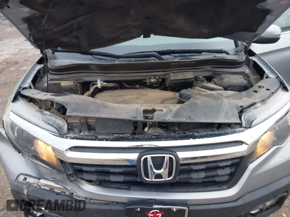 2018 Honda Ridgeline RTL with VIN 5FPYK3F52JB002649, listed as a IAAI auction lot 42338360 with 68,802 mi miles and . Bid and sale history available at DreamBid. Image 10.