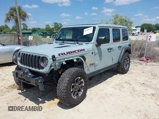 2024 Jeep Wrangler Rubicon with VIN 1C4PJXFG3RW295565, listed as a IAAI auction lot 42026211 with 5,661 mi miles. Bid and sale history available at carsss.com. Image 2.