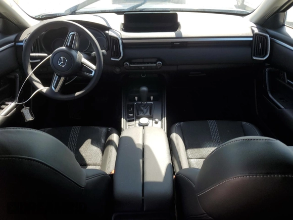 2025 Mazda CX-50 S Select with VIN 7MMVABAMXSN301011, listed as a Copart auction lot 77063504 with Not Provided miles and Salvage Title. Bid and sale history available at DreamBid. Image 8.