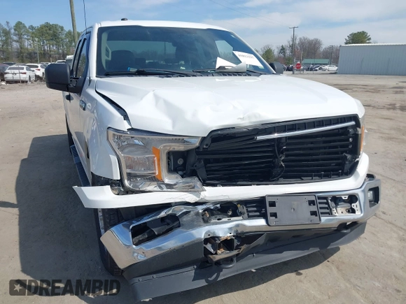 2018 Ford F-150 XL with VIN 1FTEX1EB4JFA77373, listed as a IAAI auction lot 41813197 with 235,251 mi miles and . Bid and sale history available at DreamBid. Image 6.