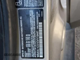 2014 BMW X1 xDrive28i with VIN WBAVL1C51EVY19441, listed as a Copart auction lot 44076115 with 107,830 mi miles and Salvage Title. Bid and sale history available at carsss.com. Image 14.