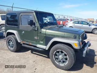2006 Jeep Wrangler SE with VIN 1J4FA29116P763914, listed as a IAAI auction lot 42140140 with 107,161 mi miles. Bid and sale history available at carsss.com. Image 1.