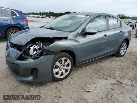 2012 Mazda 3 i Sport with VIN JM1BL1UF7C1634859, listed as a Copart auction lot 77349494 with 126,248 mi miles and Salvage Title. Bid and sale history available at DreamBid. Image 1.