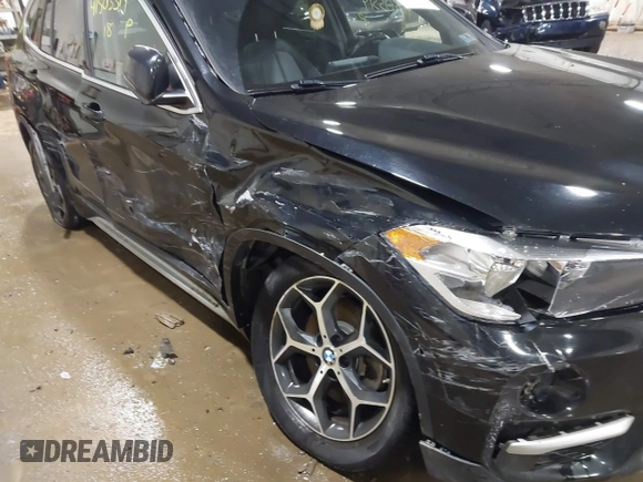 2018 BMW X1 xDrive28i with VIN WBXHT3C30J5K29383, listed as a IAAI auction lot 41503314 with 107,678 mi miles. Bid and sale history available at carsss.com. Image 6.