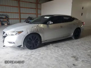 2016 Nissan Maxima SL with VIN 1N4AA6AP2GC430630, listed as a Copart auction lot 57955115 with 146,285 mi miles and Salvage title. Bid and sale history available at DreamBid. Image 1.
