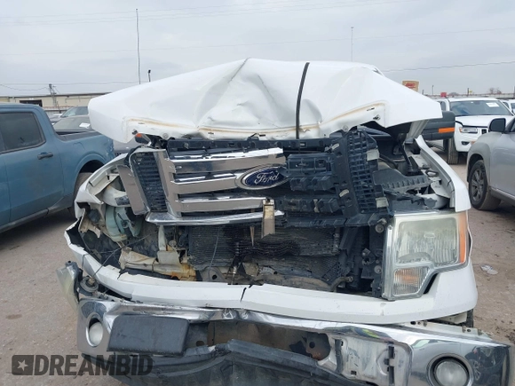2012 Ford F-150 XL z VIN 1FTFW1CFXCFC24845, wystawiony jako IAAI lot #41507563 z przebiegiem Nie podano mil oraz . Historia ofert i sprzedaży dostępna na DreamBid. Obrazek 12.