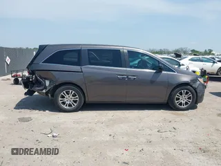 2012 Honda Odyssey EX with VIN 5FNRL5H41CB011940, listed as a IAAI auction lot 42033966 with 182,996 mi miles and . Bid and sale history available at DreamBid. Image 13.
