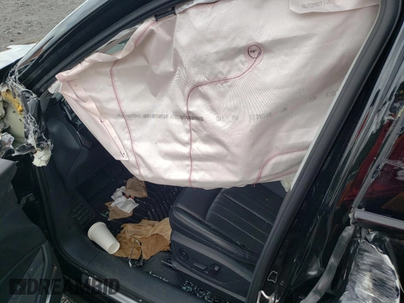 2023 Audi e-tron Premium Plus with VIN WA1LAAGE2PB007879, listed as a Copart auction lot 63622544 with Not provided miles and Salvage title. Bid and sale history available at DreamBid. Image 7.