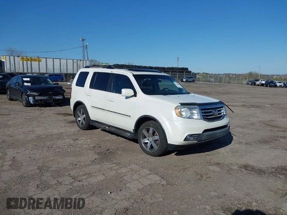 2012 Honda Pilot Touring with VIN 5FNYF4H98CB057659, listed as a IAAI auction lot 41927990 with 140,000 mi miles. Bid and sale history available at carsss.com. Image 1.