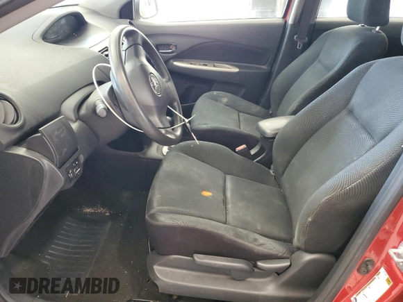 2009 Toyota Yaris with VIN JTDBT903891313898, listed as a Copart auction lot 87820085 with 212,806 mi miles and Salvage Title. Bid and sale history available at carsss.com. Image 7.