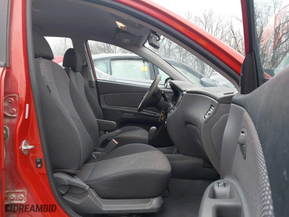 2009 Kia Rio SX with VIN KNADE223796561406, listed as a IAAI auction lot 41650749 with 100,041 mi miles. Bid and sale history available at carsss.com. Image 5.