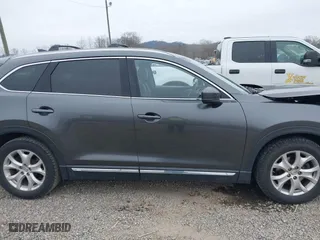 2016 Mazda CX-9 Grand Touring with VIN JM3TCBDY1G0103560, listed as a IAAI auction lot 41344813 with 123,588 mi miles. Bid and sale history available at carsss.com. Image 13.