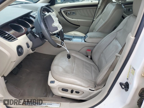 2010 Ford Taurus Limited with VIN 1FAHP2FW8AG162978, listed as a Copart auction lot 57617625 with 228,621 mi miles and Salvage title. Bid and sale history available at DreamBid. Image 7.
