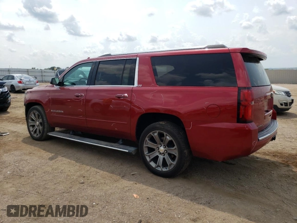 2015 Chevrolet Suburban LTZ with VIN 1GNSKKKC6FR556105, listed as a Copart auction lot 64034304 with 106,269 mi miles and Salvage Title. Bid and sale history available at DreamBid. Image 2.