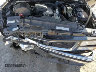 1999 GMC Suburban z VIN 3GKGK26J2XG514835, wystawiony jako Copart lot #47853685 z przebiegiem 124 657 mil mil oraz Tytuł czysty. Historia ofert i sprzedaży dostępna na DreamBid. Obrazek 13.
