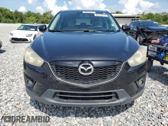 2014 Mazda CX-5 Touring z VIN JM3KE2CY8E0326988, wystawiony jako Copart lot #60473715 z przebiegiem 231 055 mil mil oraz Czysty tytuł • Clean title. Historia ofert i sprzedaży dostępna na DreamBid. Obrazek 5.