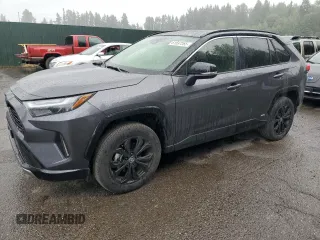 2023 Toyota RAV4 Hybrid XSE with VIN JTME6RFV5PJ037206, listed as a Copart auction lot 61597265 with 5,094 mi miles and Salvage title. Bid and sale history available at DreamBid. Image 1.