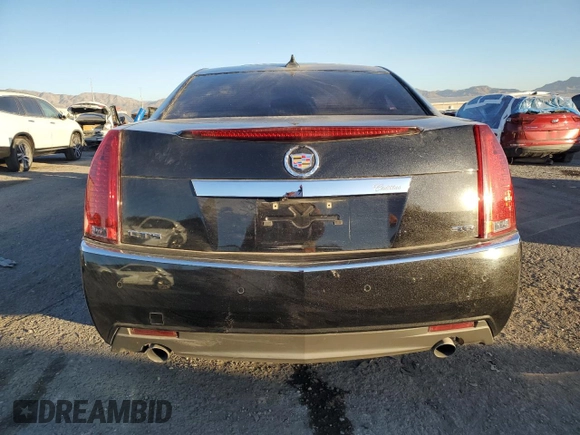2012 Cadillac CTS Premium с VIN 1G6DP5E39C0103583, выставлен на аукционе Copart как лот 84482794 с пробегом 176 233 миль миль и Списание • Salvage title. История ставок и продаж доступна на DreamBid. Изображение 6.