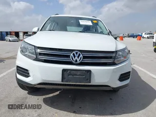 2016 Volkswagen Tiguan S with VIN WVGBV7AX5GW600479, listed as a IAAI auction lot 41828028 with 131,910 mi miles and . Bid and sale history available at DreamBid. Image 13.