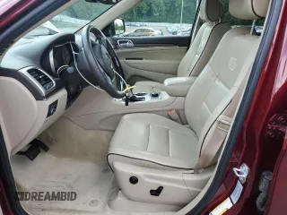 2017 Jeep Grand Cherokee Overland with VIN 1C4RJFCG5HC874130, listed as a Copart auction lot 65324695 with 101,588 mi miles and Salvage title. Bid and sale history available at DreamBid. Image 7.