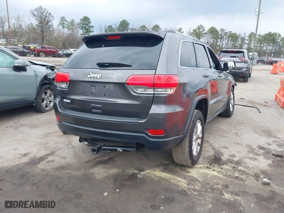 2014 Jeep Grand Cherokee Laredo with VIN 1C4RJEAG1EC573704, listed as a IAAI auction lot 41864355 with 141,970 mi miles. Bid and sale history available at carsss.com. Image 4.