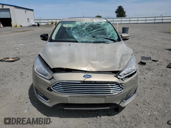 2017 Ford Focus Titanium with VIN 1FADP3N24HL279705, listed as a Copart auction lot 60169005 with 80,146 mi miles and Salvage title. Bid and sale history available at DreamBid. Image 5.