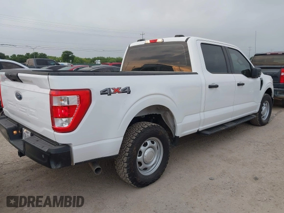 2022 Ford F-150 XL with VIN 1FTFW1E51NKE67183, listed as a IAAI auction lot 42123925 with 100,877 mi miles. Bid and sale history available at carsss.com. Image 4.