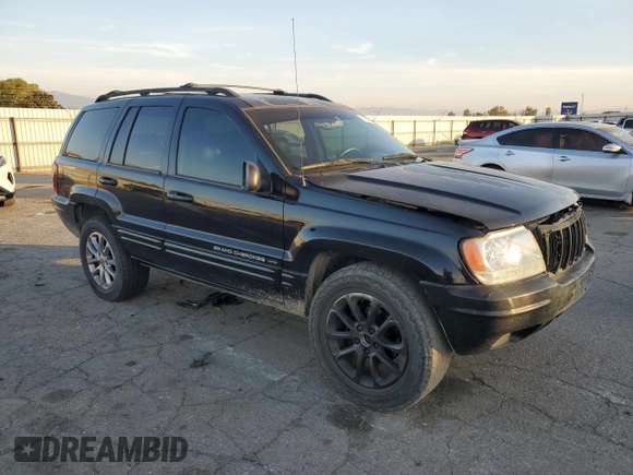 2001 Jeep Grand Cherokee Limited with VIN 1J4GX58S01C652737, listed as a Copart auction lot 81635494 with 175,498 mi miles and Salvage Title. Bid and sale history available at DreamBid. Image 4.