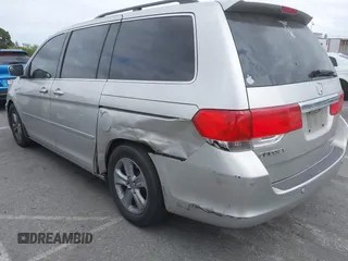 2008 Honda Odyssey Touring with VIN 5FNRL38908B058867, listed as a IAAI auction lot 42126471 with 201,088 mi miles and . Bid and sale history available at DreamBid. Image 3.