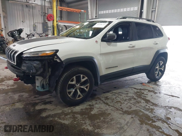 2016 Jeep Cherokee Trailhawk z VIN 1C4PJMBS6GW242123, wystawiony jako IAAI lot #41156712 z przebiegiem 136 596 mil mil oraz . Historia ofert i sprzedaży dostępna na DreamBid. Obrazek 19.