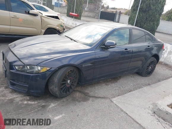2017 Jaguar XE 25t Prestige z VIN SAJAE4BG7HA965131, wystawiony jako IAAI lot #41470414 z przebiegiem 131 300 mil mil oraz . Historia ofert i sprzedaży dostępna na DreamBid. Obrazek 2.