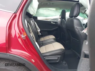 2021 Ford Escape Titanium Hybrid with VIN 1FMCU9DZ1MUA01599, listed as a IAAI auction lot 41912441 with 20,660 mi miles and . Bid and sale history available at DreamBid. Image 8.