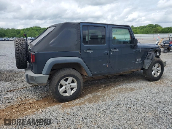 2007 Jeep Wrangler Unlimited X with VIN 1J4GA39117L119395, listed as a Copart auction lot 52588055 with 160,335 mi miles and Salvage title. Bid and sale history available at DreamBid. Image 3.