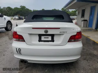 2011 BMW 1 Series 128i with VIN WBAUN1C5XBVH82605, listed as a Copart auction lot 73457334 with 94,969 mi miles and Salvage Title. Bid and sale history available at carsss.com. Image 6.