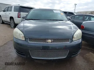 2014 Chevrolet Impala LT with VIN 2G1WB5E35E1123415, listed as a IAAI auction lot 41101111 with 129,870 mi miles and . Bid and sale history available at DreamBid. Image 12.