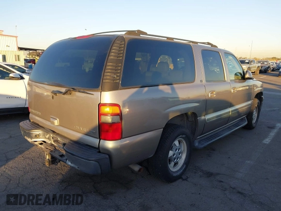 2003 Chevrolet Suburban LS with VIN 1GNEC16T43J269726, listed as a IAAI auction lot 41109855 with 122,820 mi miles. Bid and sale history available at carsss.com. Image 4.